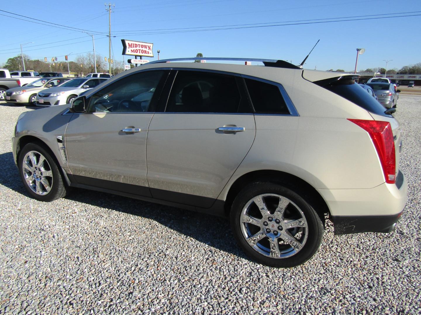 2012 Gold Cadillac SRX Premium (3GYFNCE36CS) with an 3.6L V6 DOHC 24V FFV engine, Automatic transmission, located at 15016 S Hwy 231, Midland City, AL, 36350, (334) 983-3001, 31.306210, -85.495277 - Photo#5